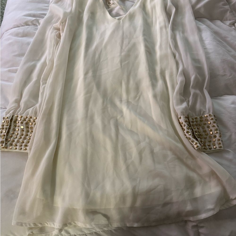 Elegant Cream Dress with Embellished Cuffs